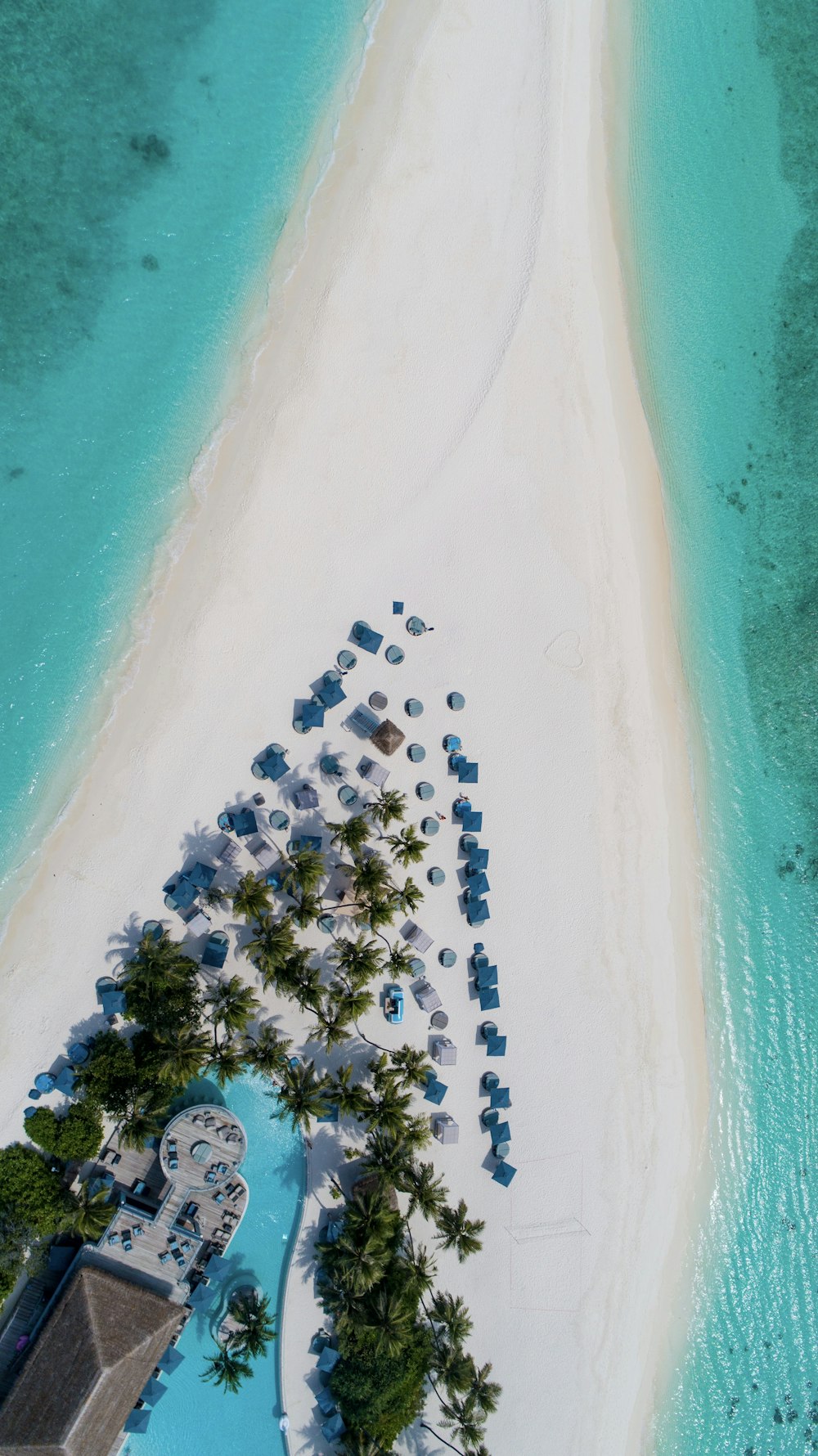 beach resort on white sand bar