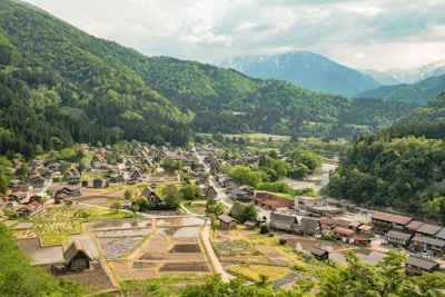 houses and rice paddies at the valley with river
