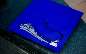 blue and white academic hat