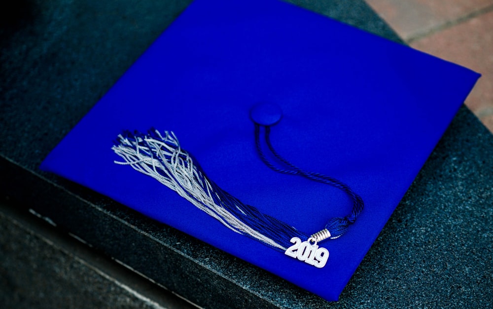 blue and white academic hat