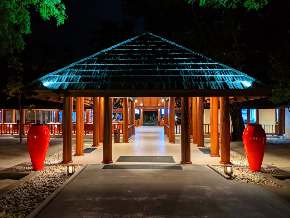 empty brown wooden canopy at night