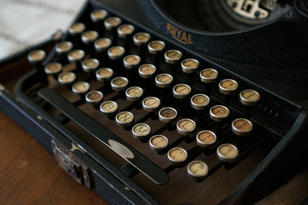 gray and brown Royal typewritter