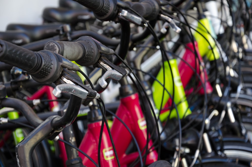 pile of red and green bicycles