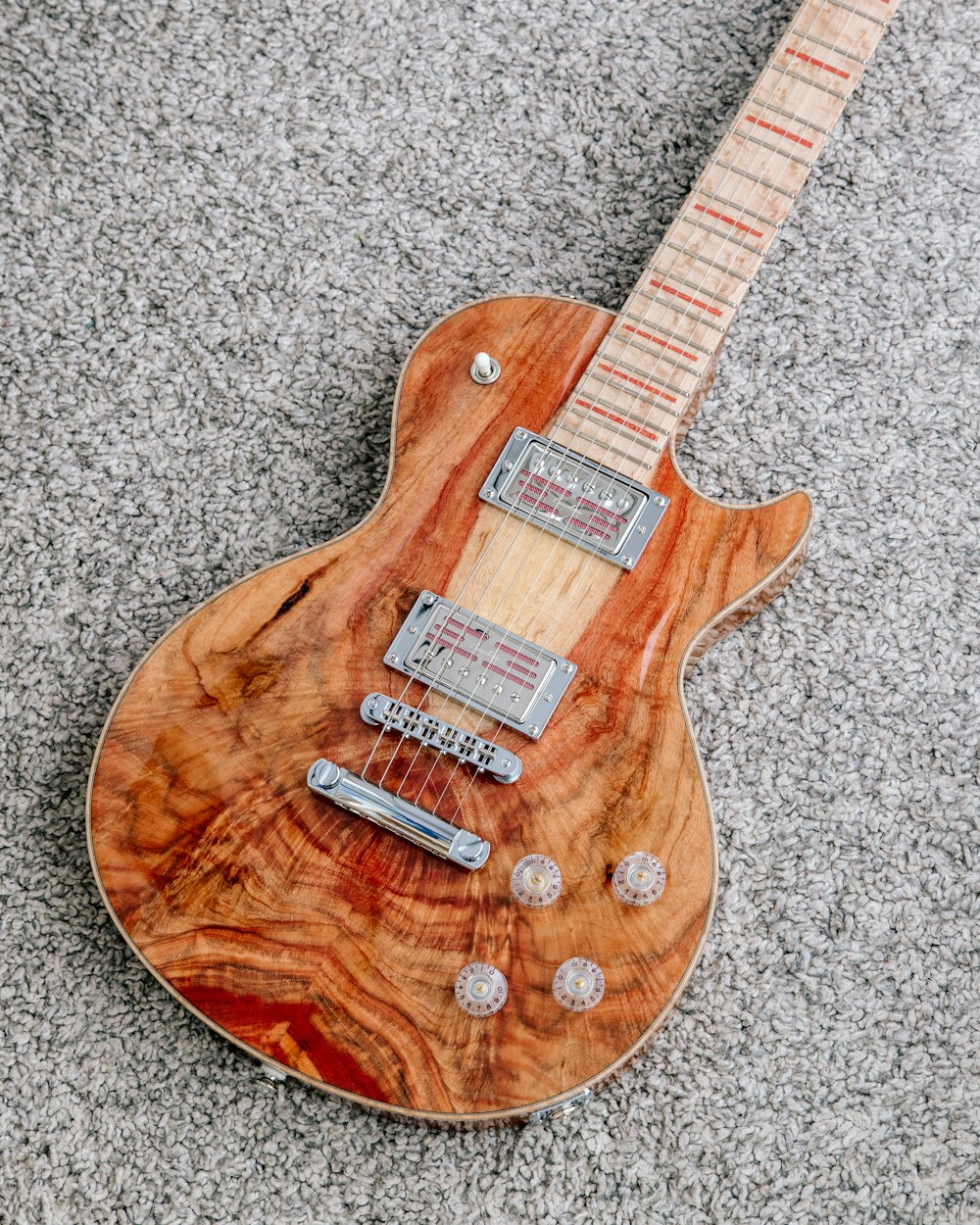 brown electric guitar