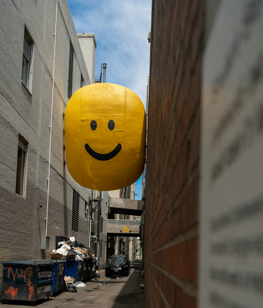 yellow emoji signage