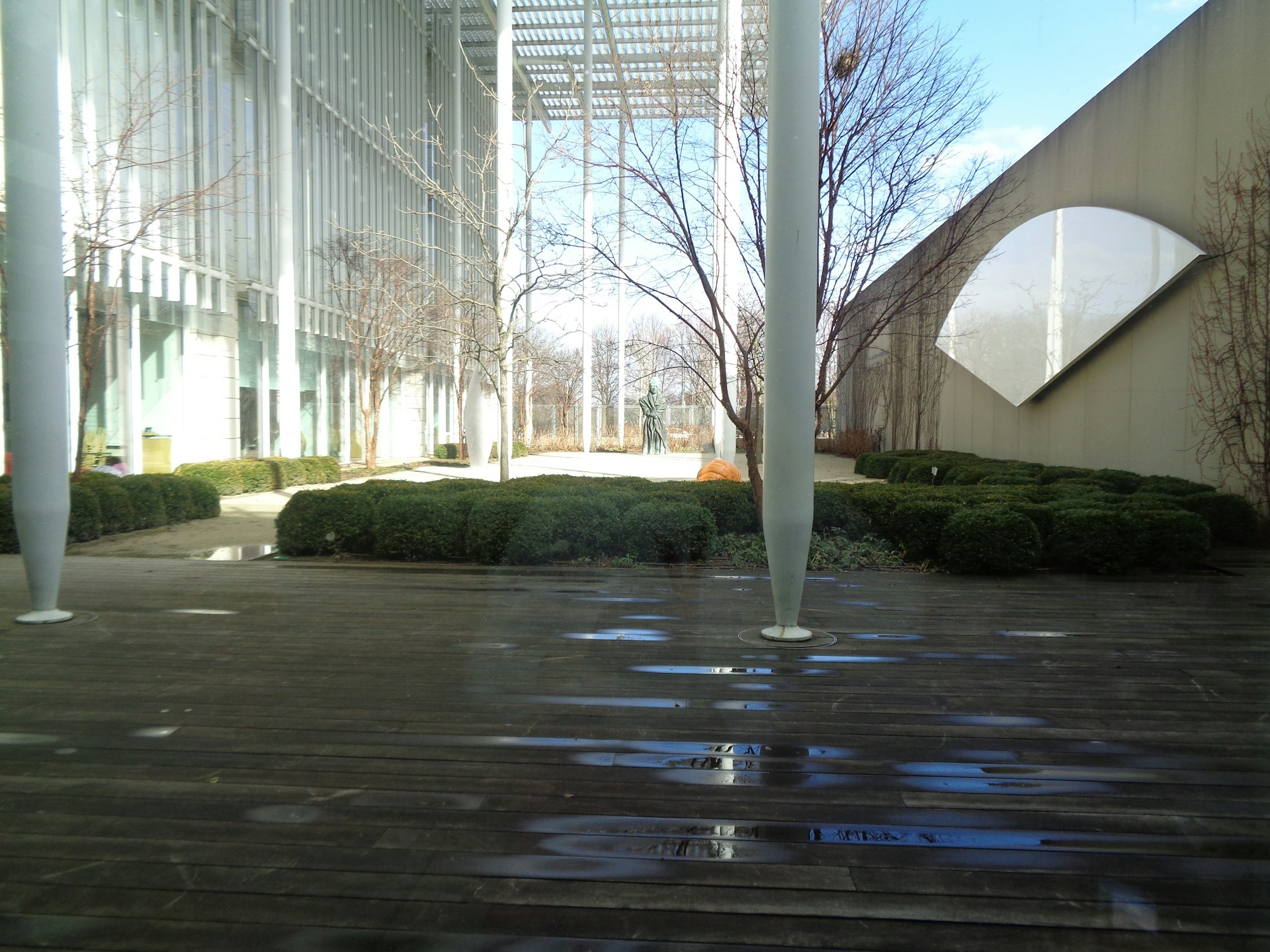 woman wearing yellow long-sleeved dress under white clouds and blue sky during daytime