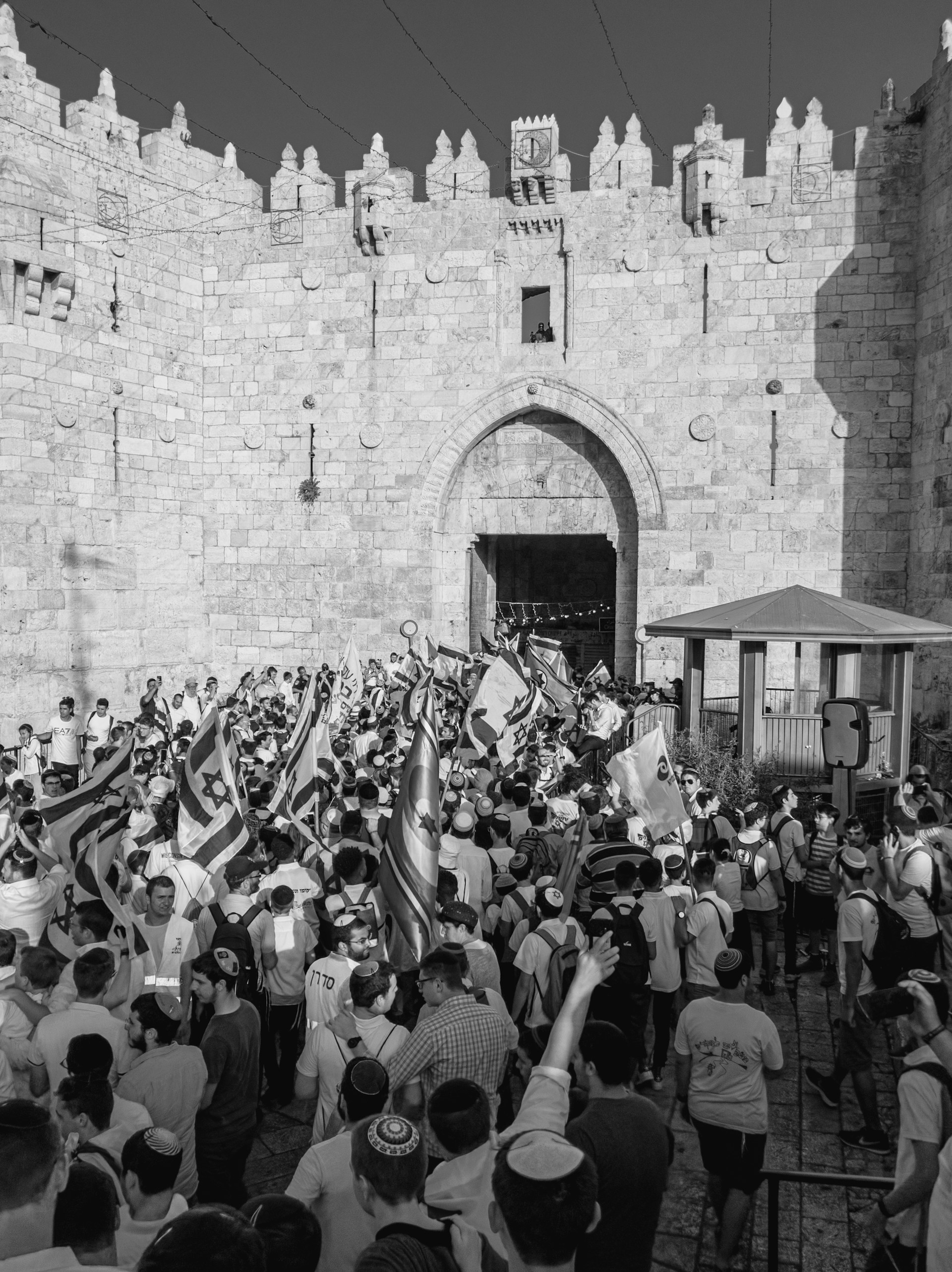 people walking to the castle