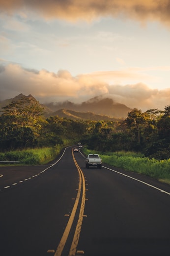white pickup truck on road