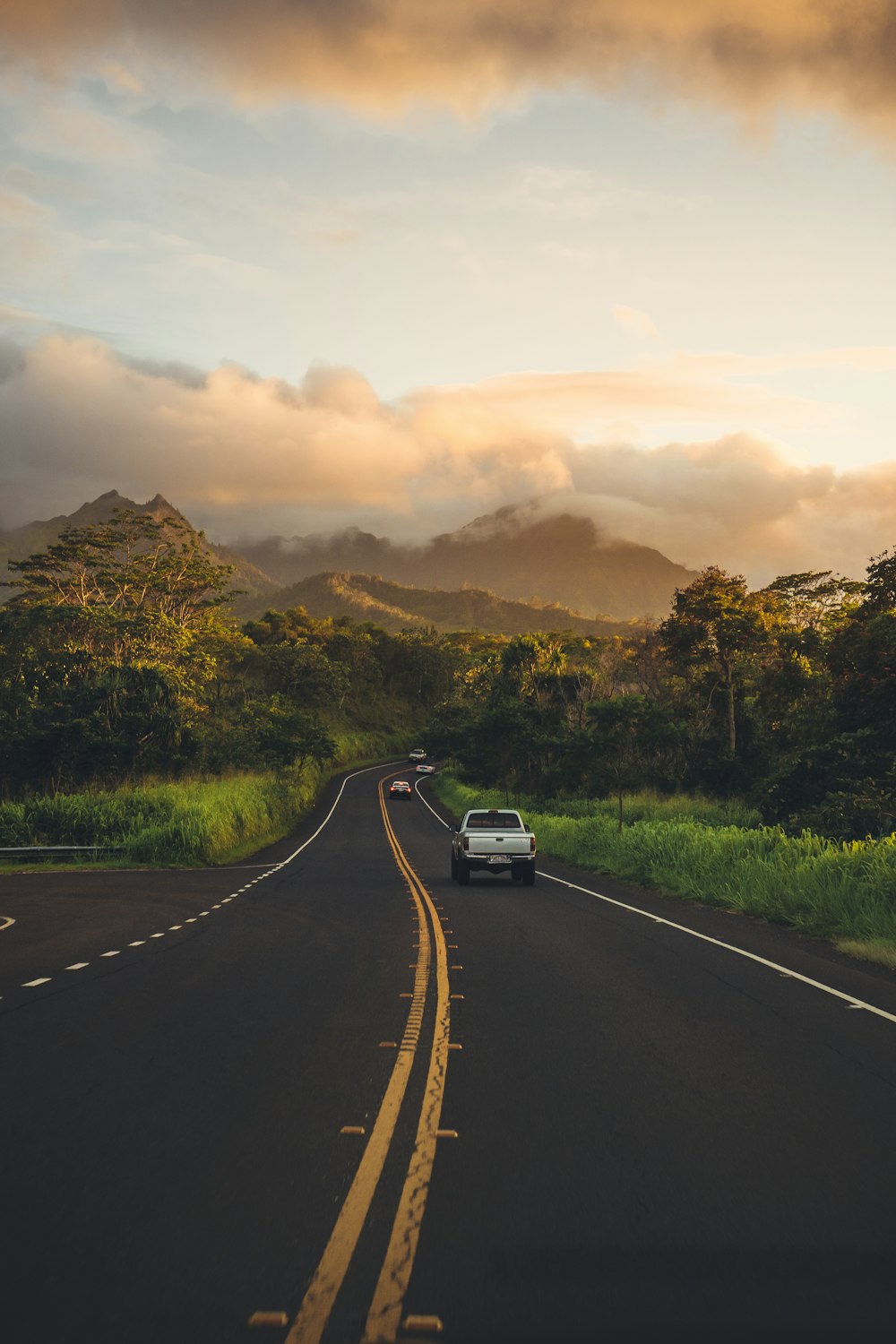 white pickup truck on road