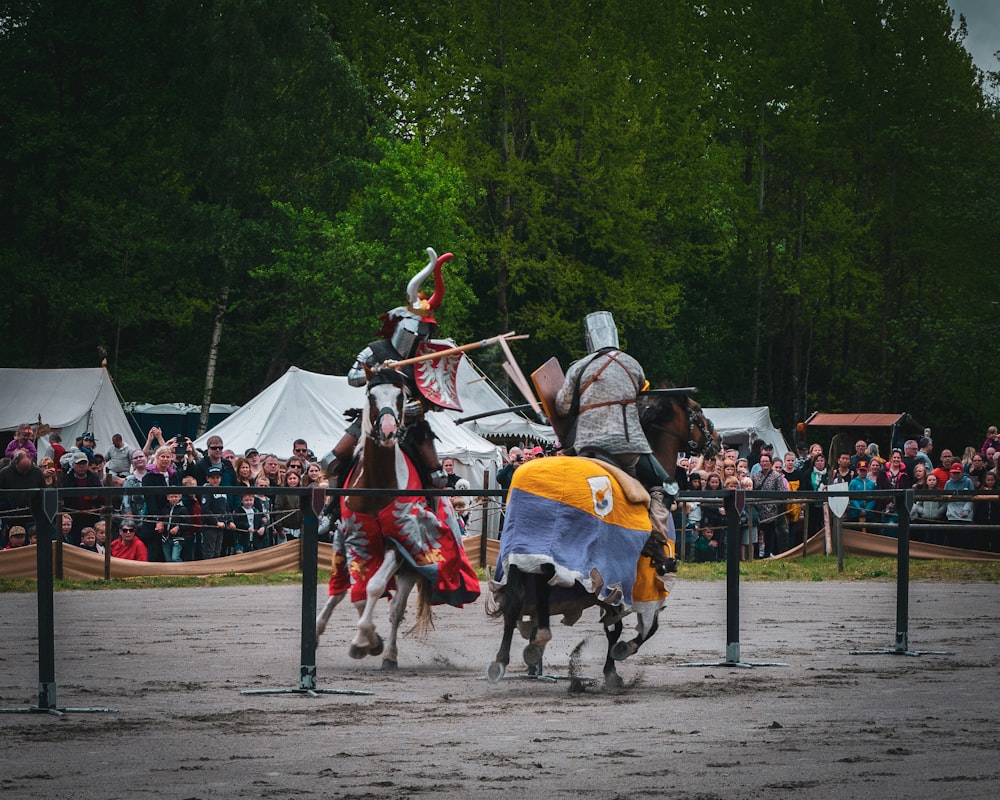 two men riding horses