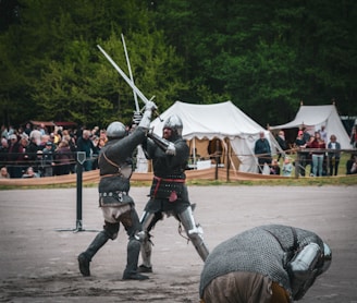 men fighting with sword