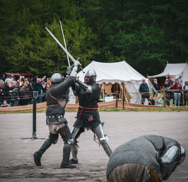 men fighting with sword