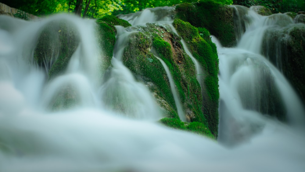 time lapse photo of waterfalls