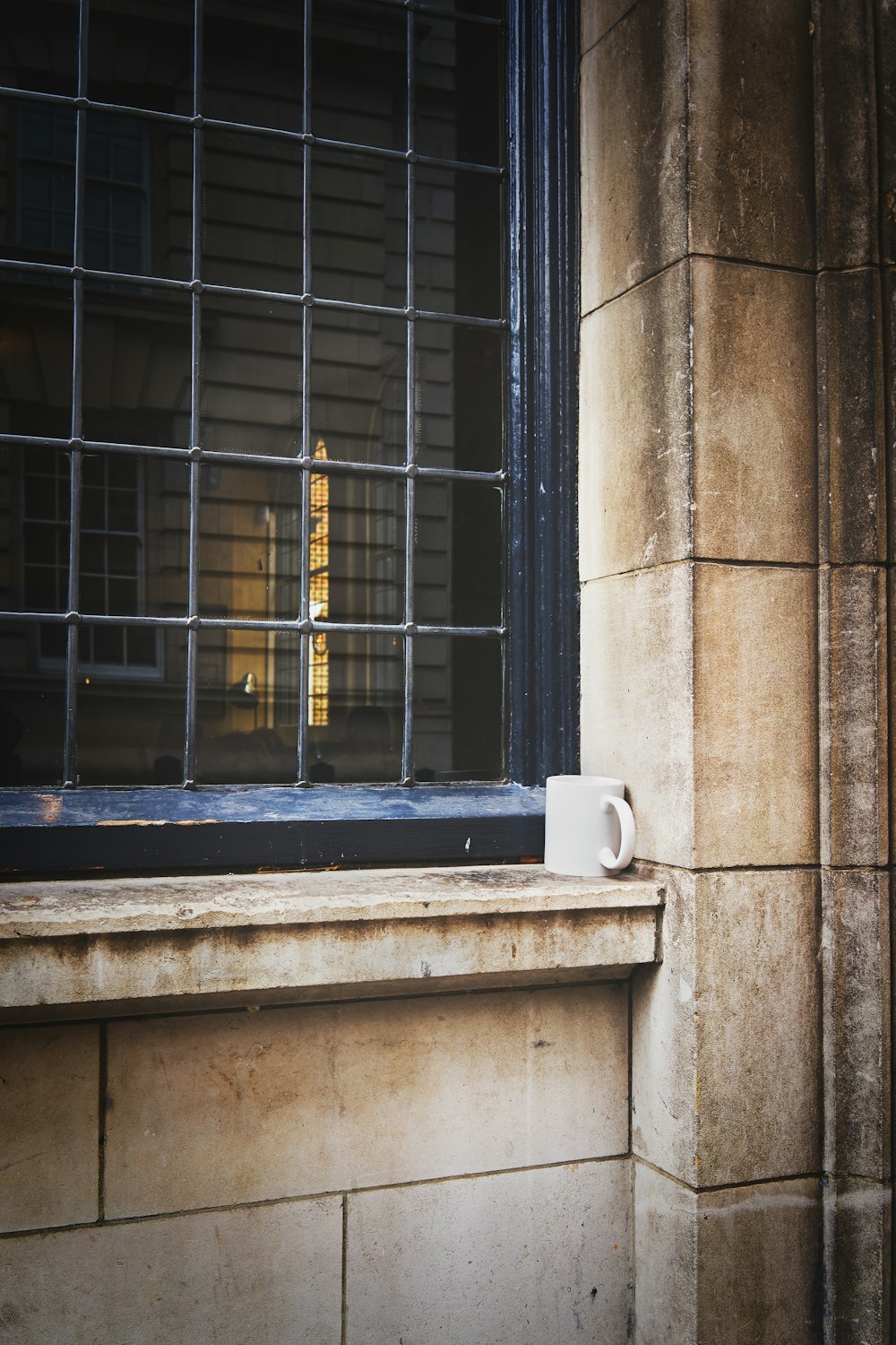 brown concrete wall with metal frame