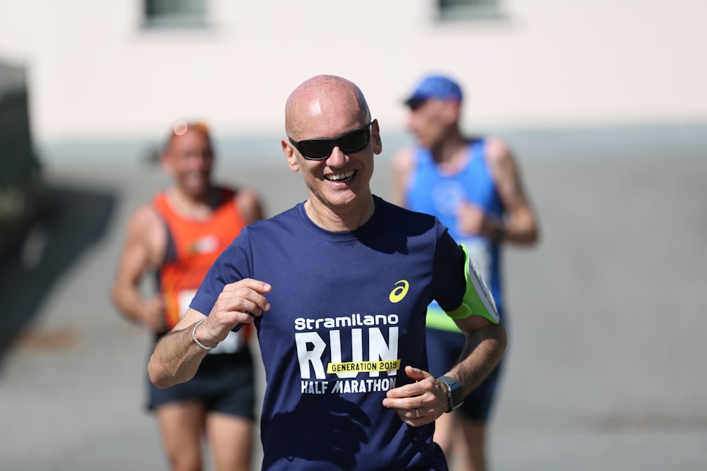 three men running