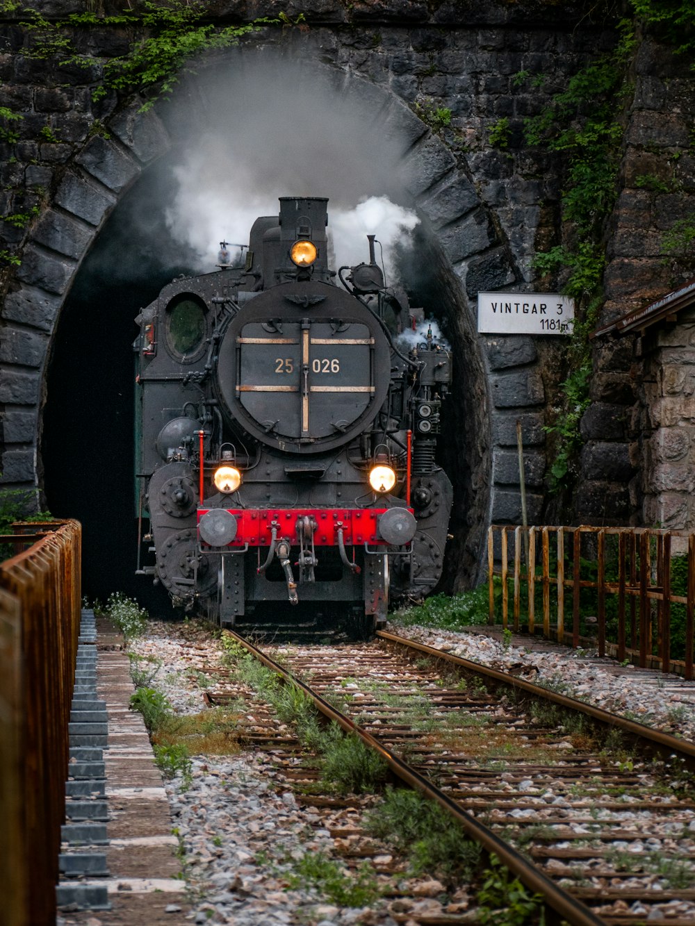 black train on rails