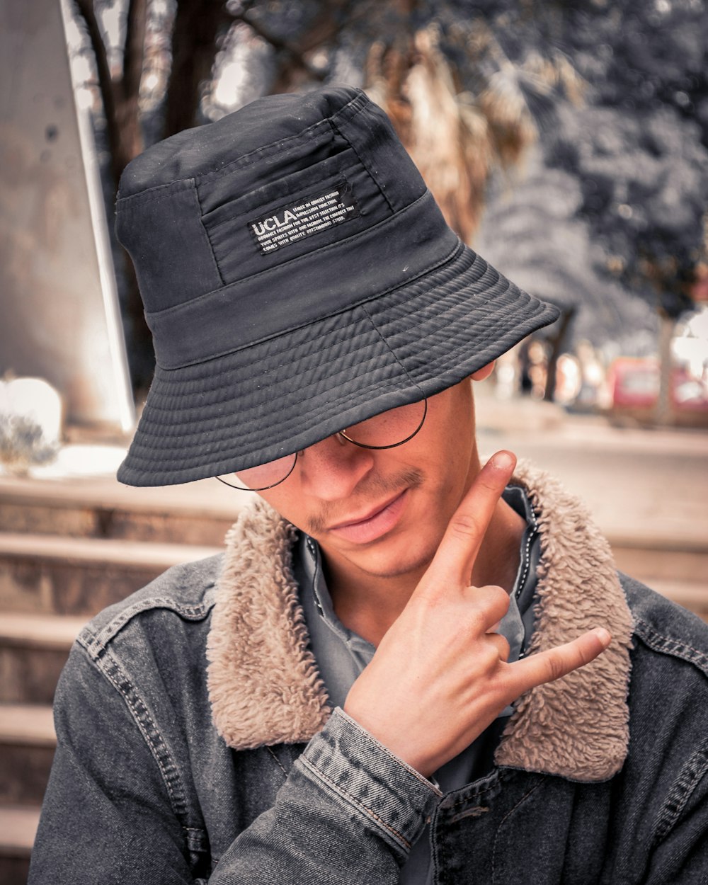 man wearing black bucket hat