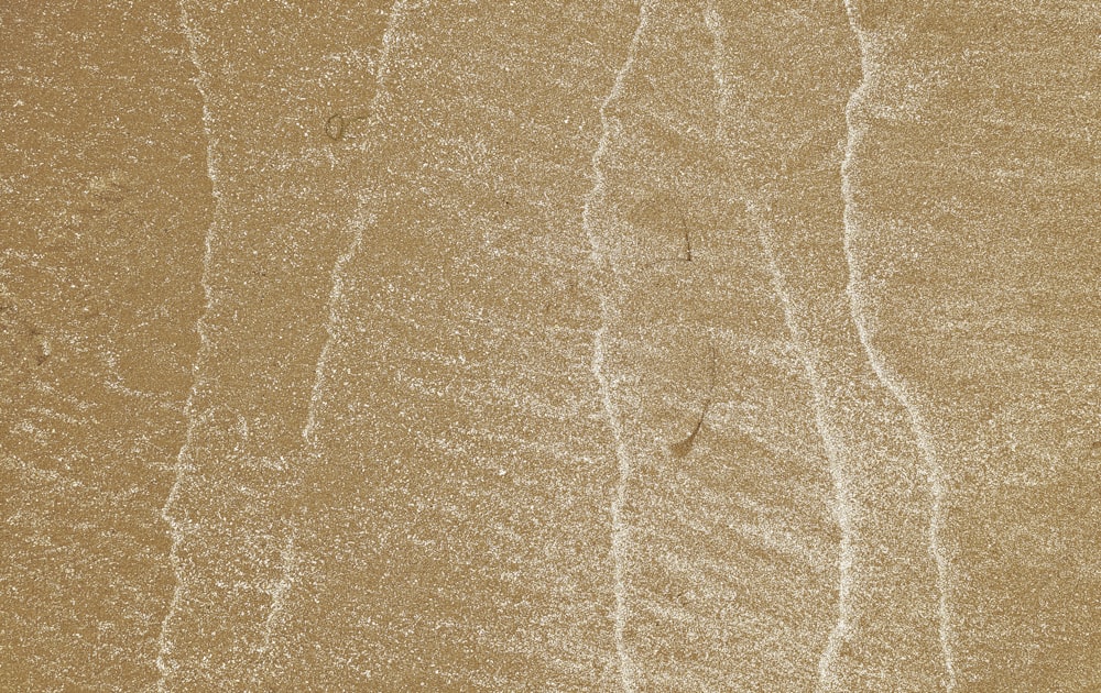 wavy sea on sand