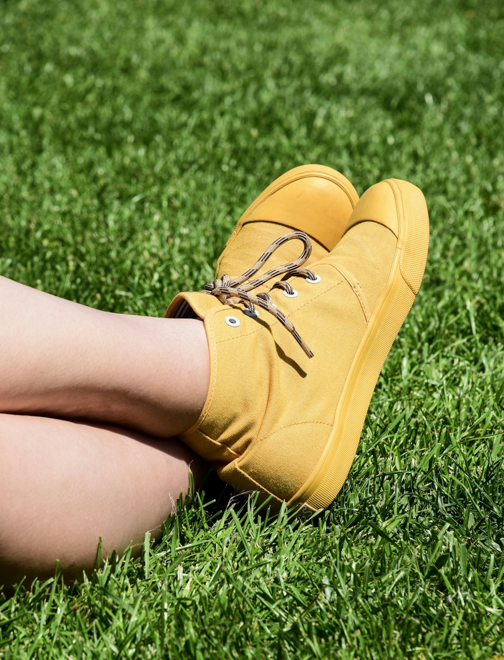 pair of brown high-top sneakers