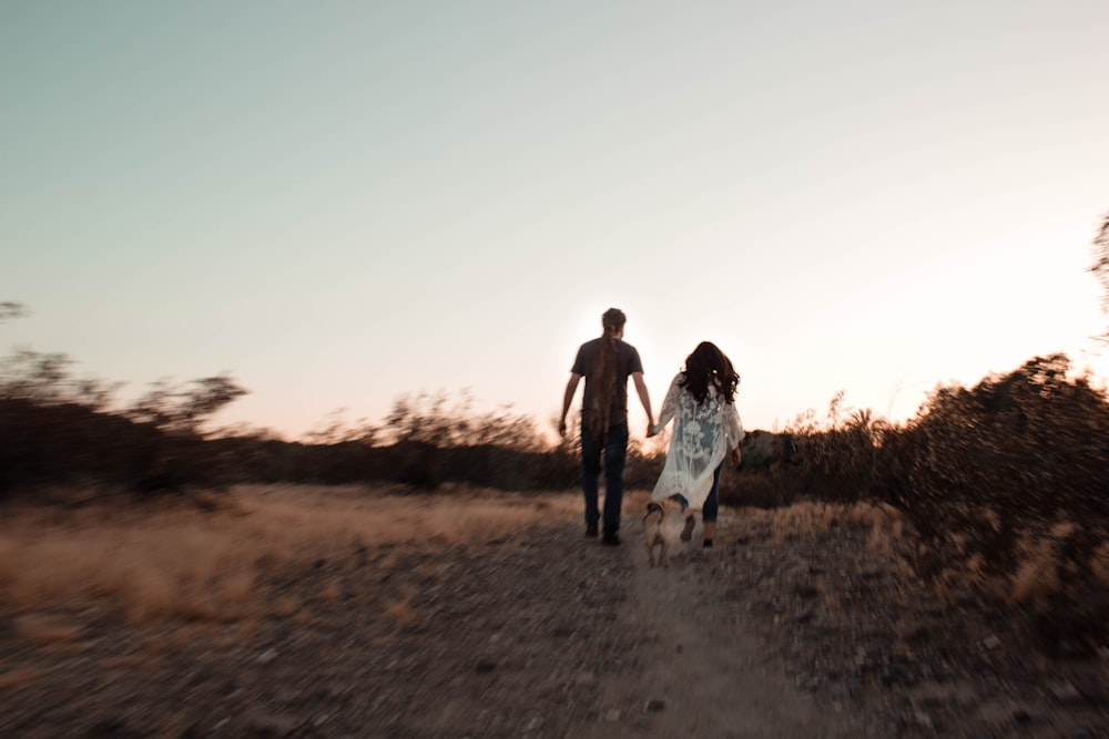 man and woman near road