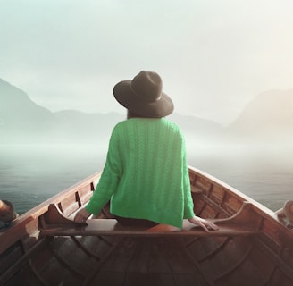woman sitting on boat