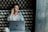 man sitting in front of silver MacBook
