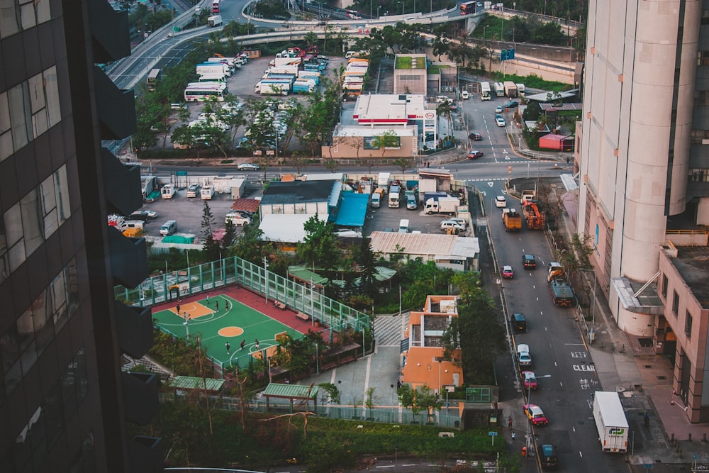 vehicles passing by near buildngs