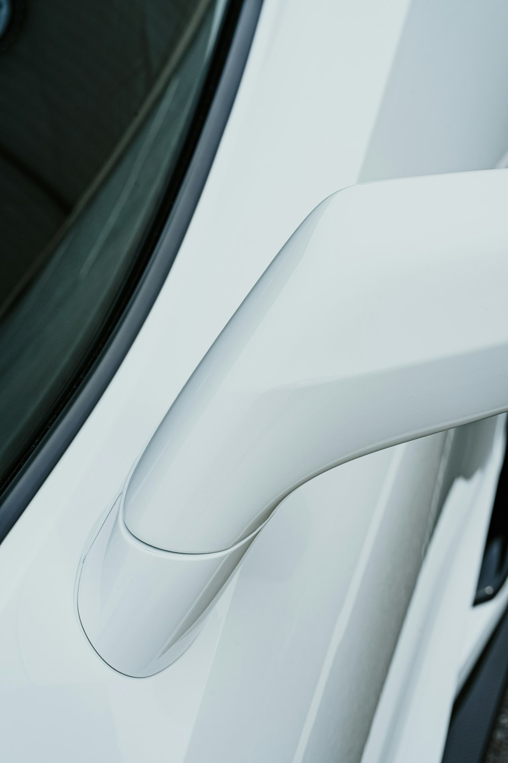 white vehicle side mirror