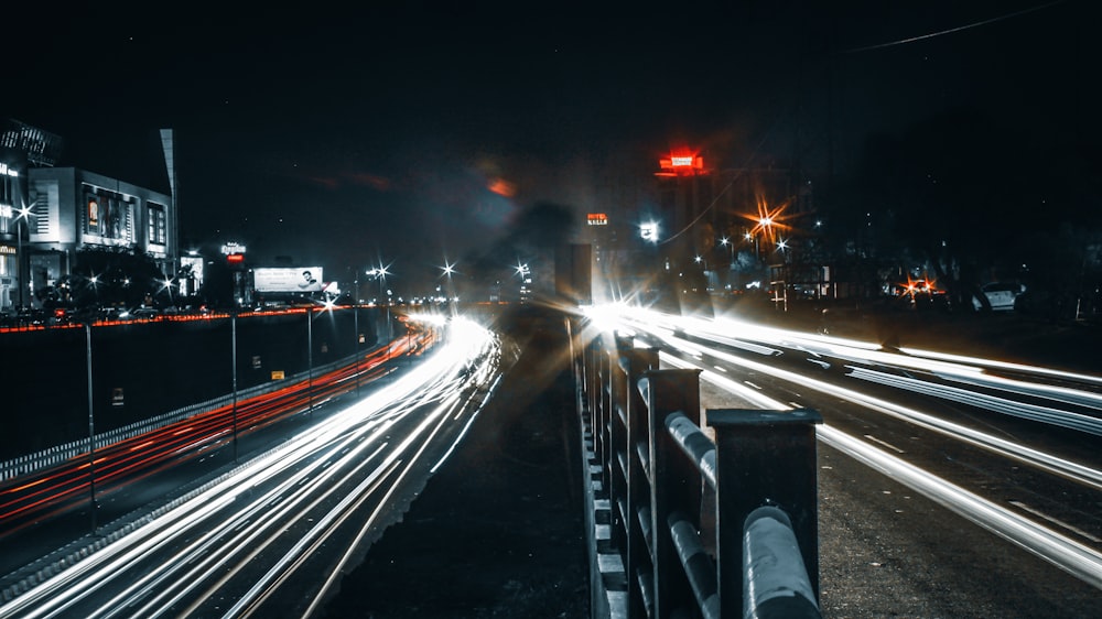 cars with lights on in city highways