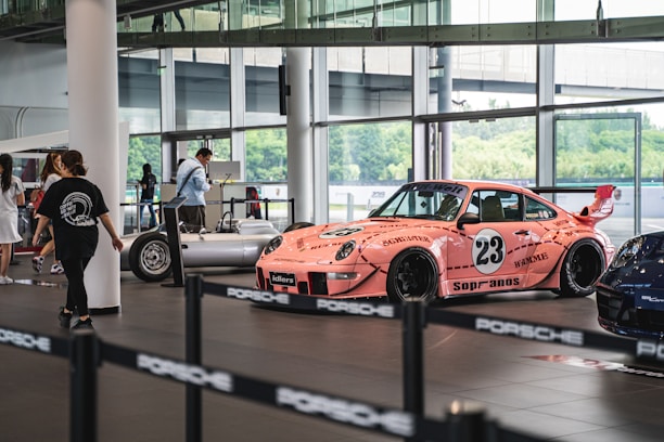 pink vehicle parked inside room