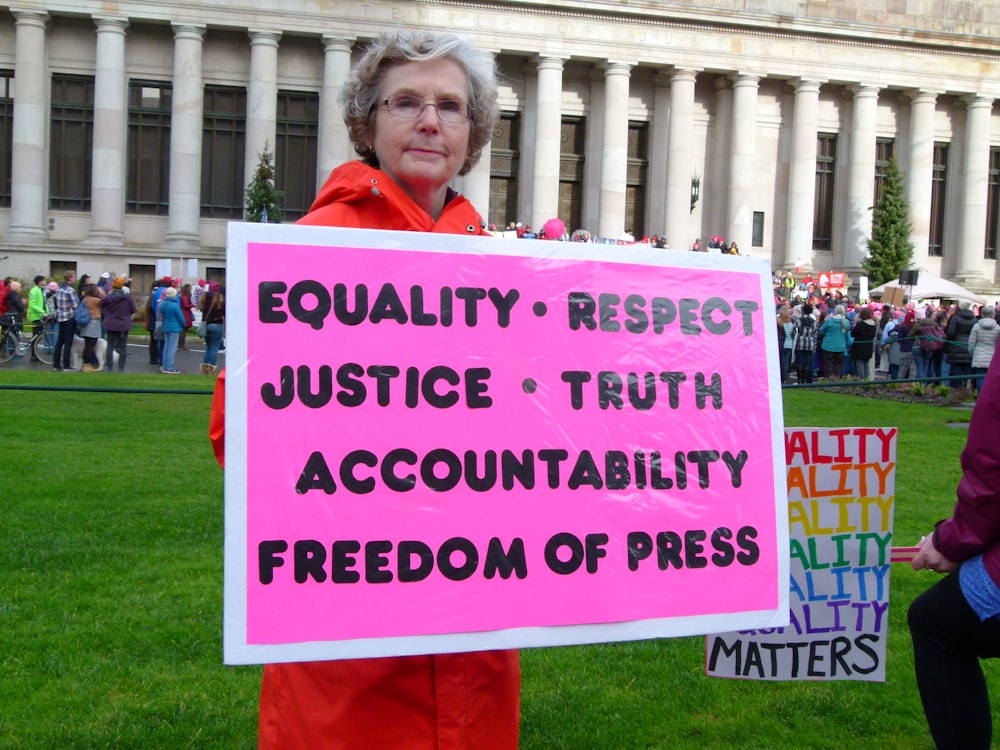 woman holding placard