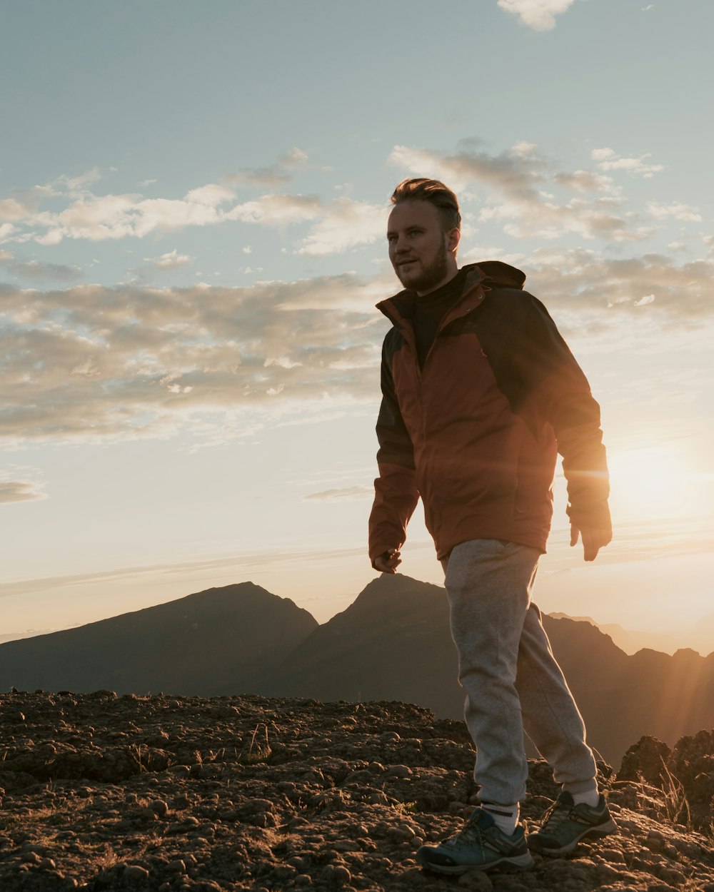 man standing on mountain