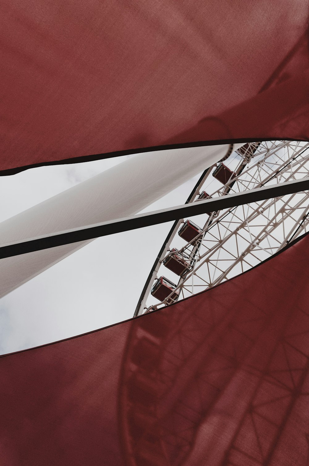 grey and red ferris wheel