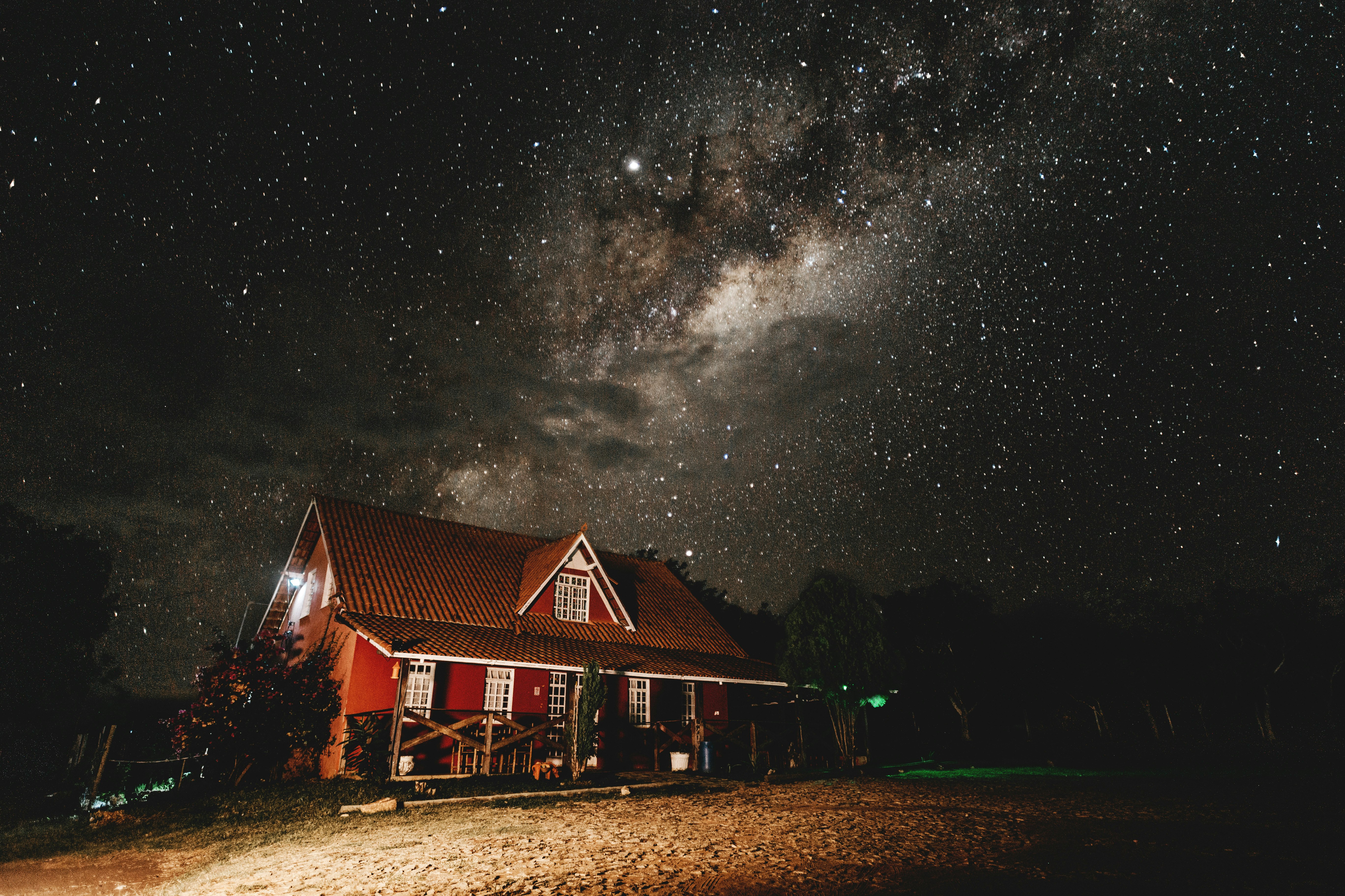 red wooden house at night time