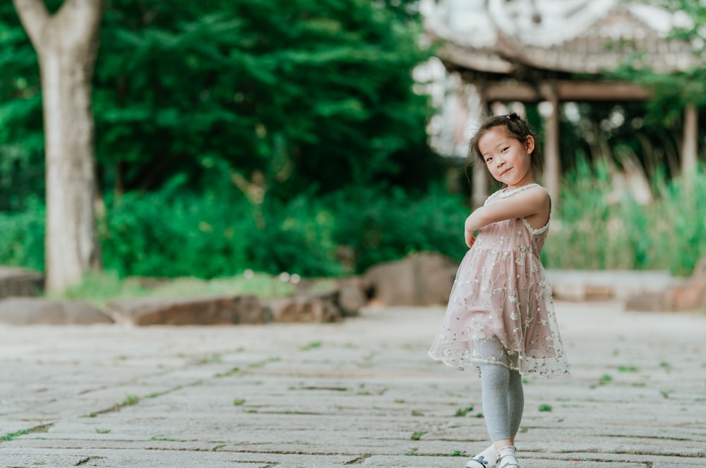 Girl Crossing Her Legs While Standing Near Tree Photo Free Footwear Image On Unsplash girl crossing her legs while standing