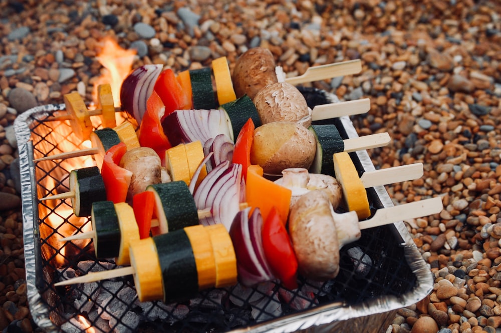 skewered vegetables on grill