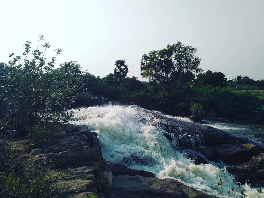 time lapse photography of waterfalls