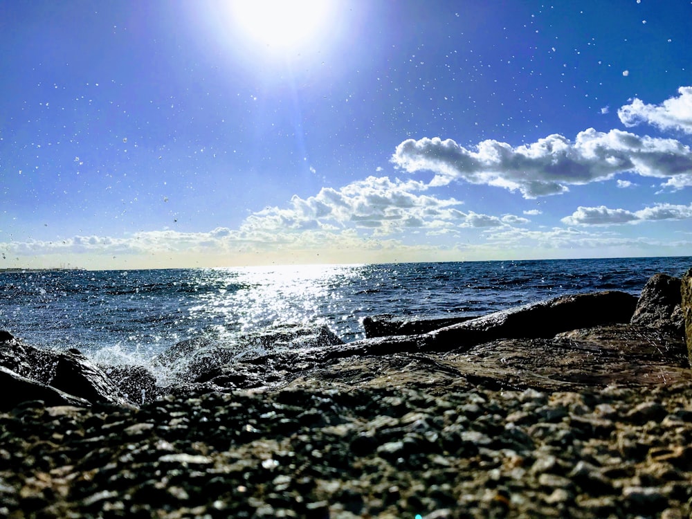 white cloudy blue sky over sea