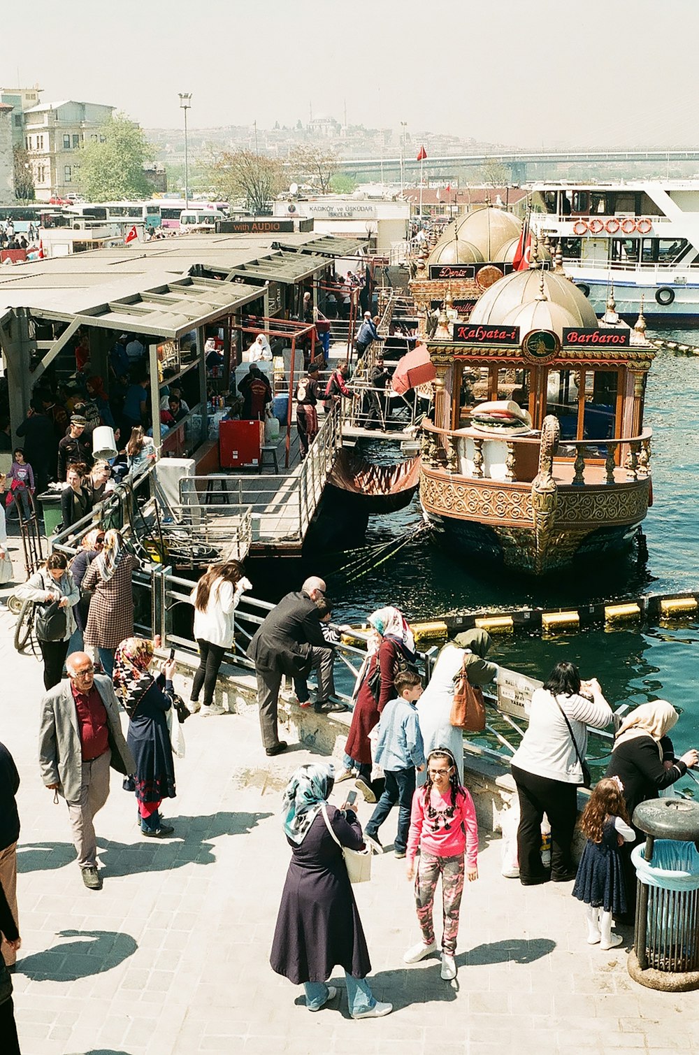 people walking near boat