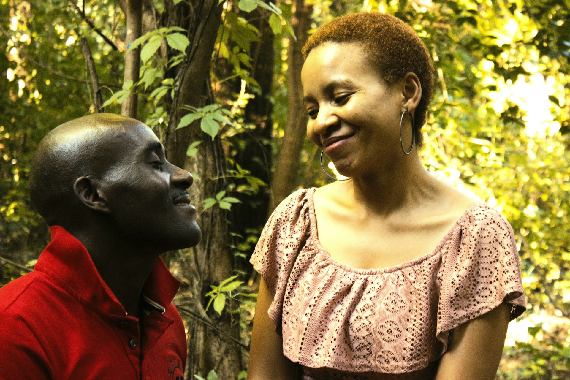 woman wearing yellow long-sleeved dress under white clouds and blue sky during daytime