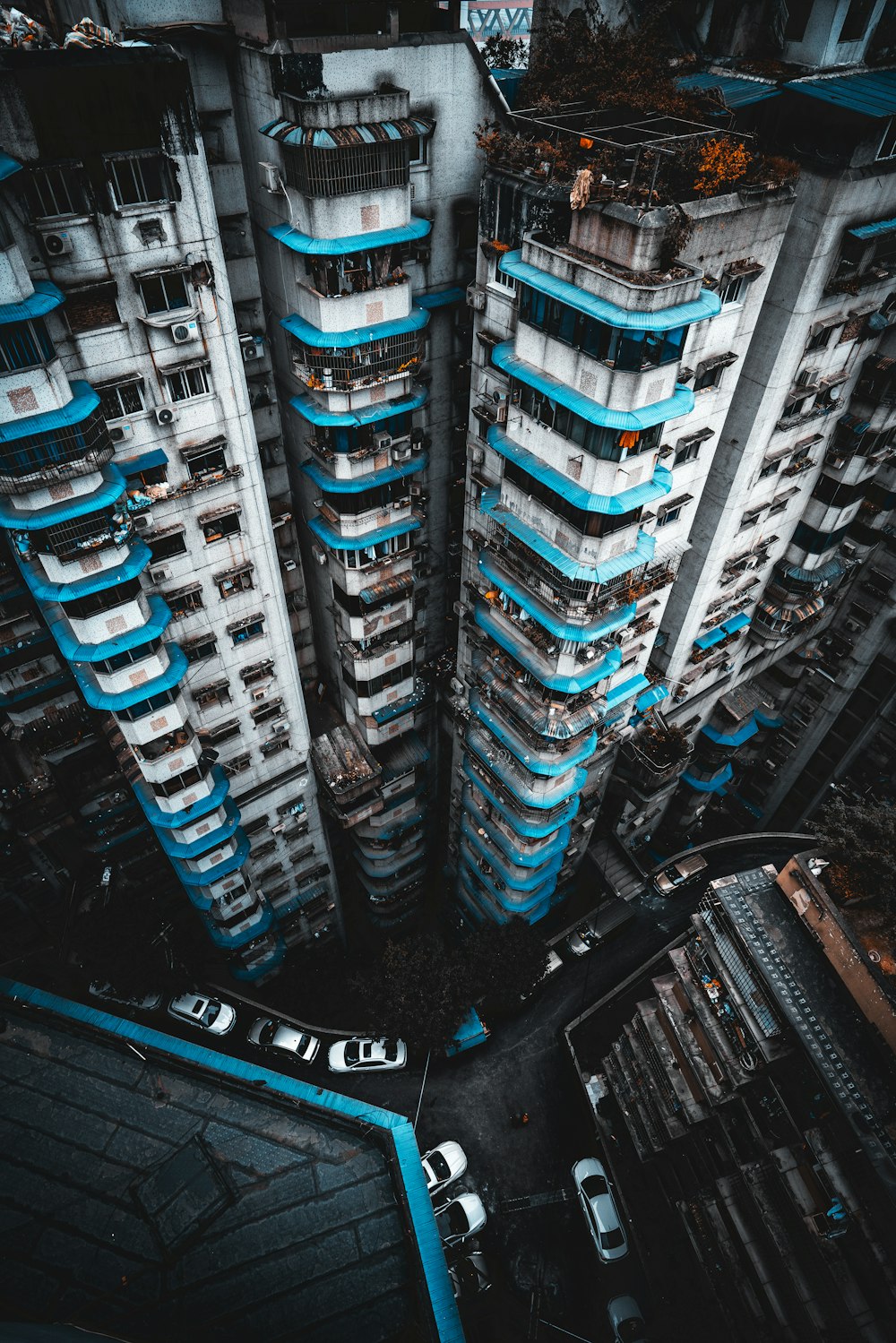 vehicles near buildings in high-angle photo