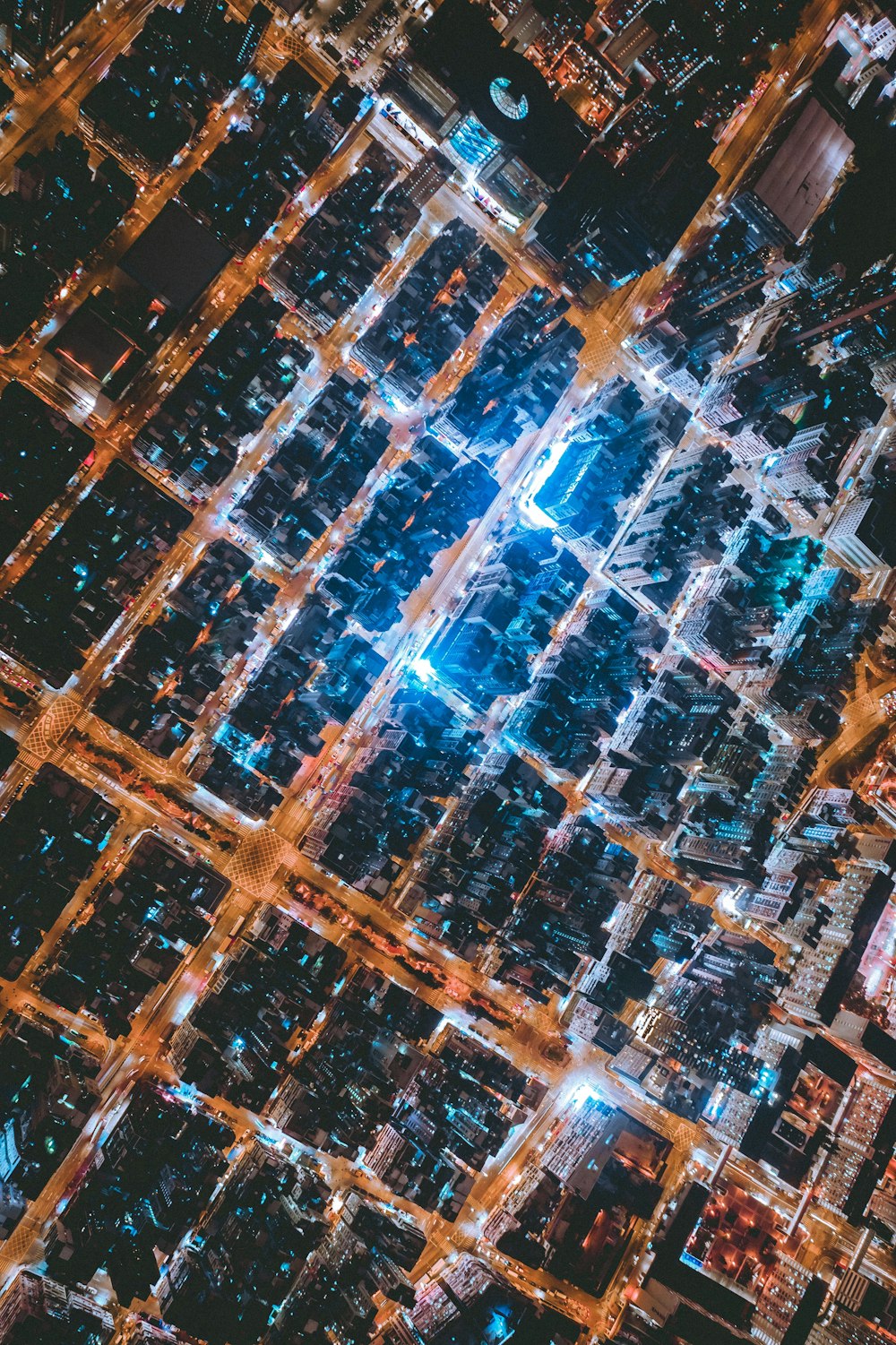 an aerial view of a city at night