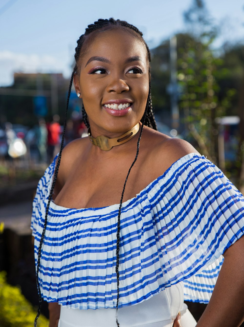 selective focus photography of smiling woman near outdoor during daytime