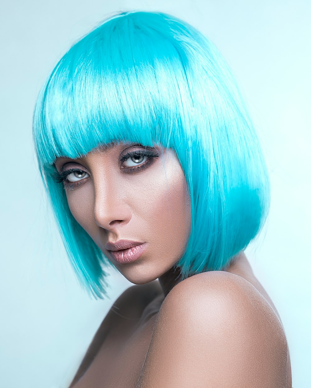 woman wearing blu wig