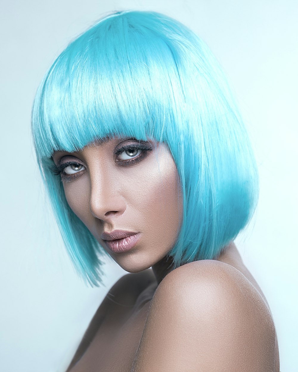 woman wearing blu wig