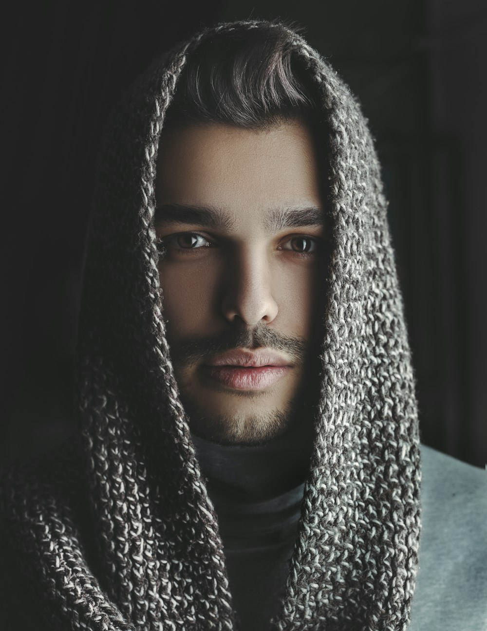man wearing gray headscarf