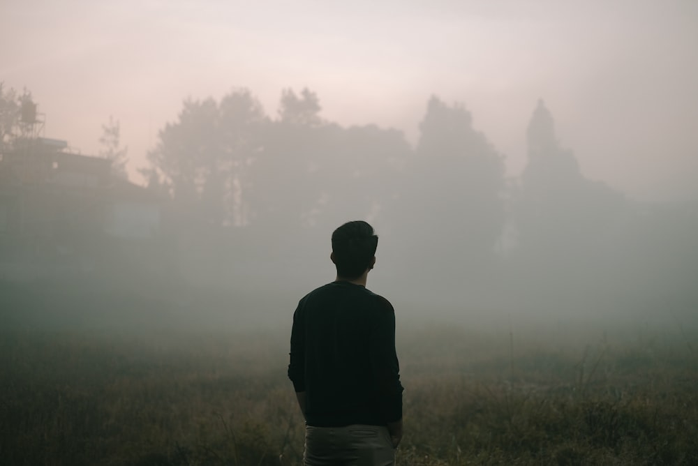 unknown person standing outdoors