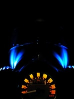 black vehicle speedometer