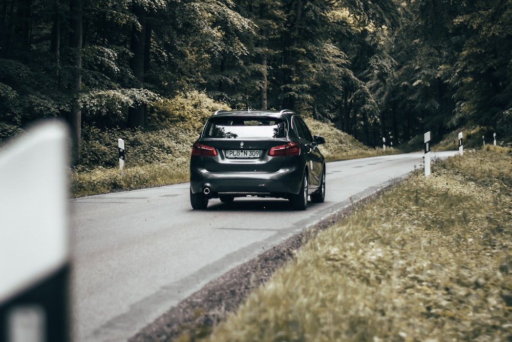 black car on road