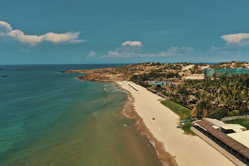 bird's eye view of house near shore